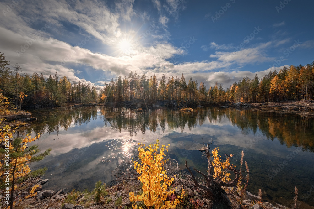 Fototapeta premium A fine sunny day was pleasing with colors on a small lake not far from Kem river