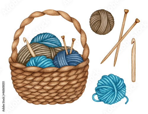 Knitting. Wicker basket with colored balls of wool yarn and crochet hooks  on wooden background. Stock Photo