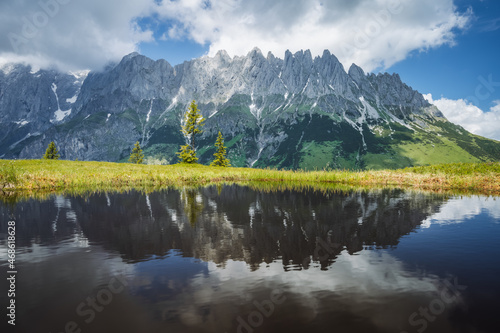 Obraz na płótnie Mountain pond with Wilder Kaiser range reflecting in water pond, Tirol - Austria w salonie