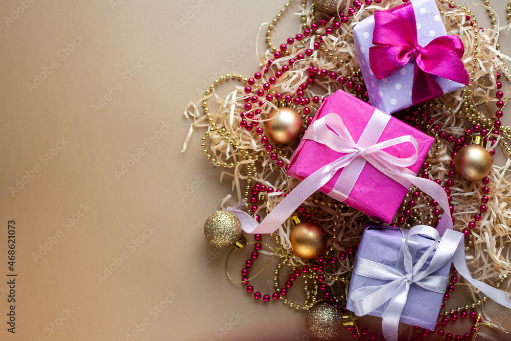 pink Christmas mood. Gifts and presents with bow. New Year pink Christmas mood. Gifts and presents with bow. New Year