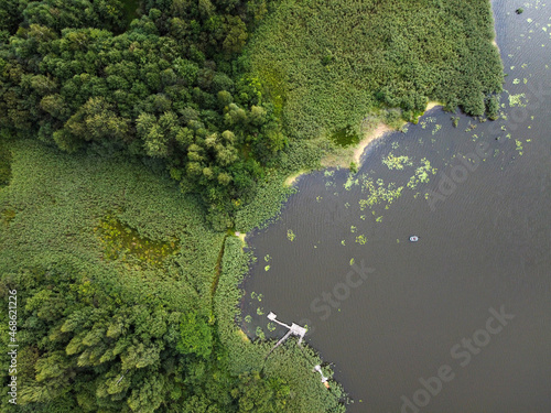 Aerial view of summer landscape with river and forest © mikeosphoto
