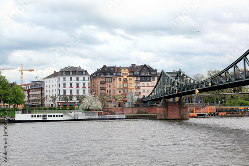 The Eiserner Steg Bridge – a pedestrian bridge in Frankfurt am Main. The “love lock” bridge is all about people putting padlocks and writing their names in permanent marker or using laser engraving. photo