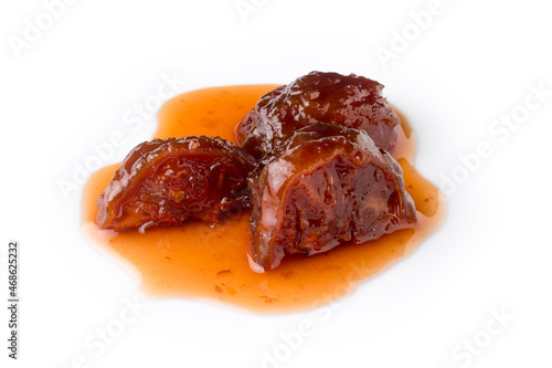 ambarella or june plum jam, homemade sweet food closeup isolated on white background photo