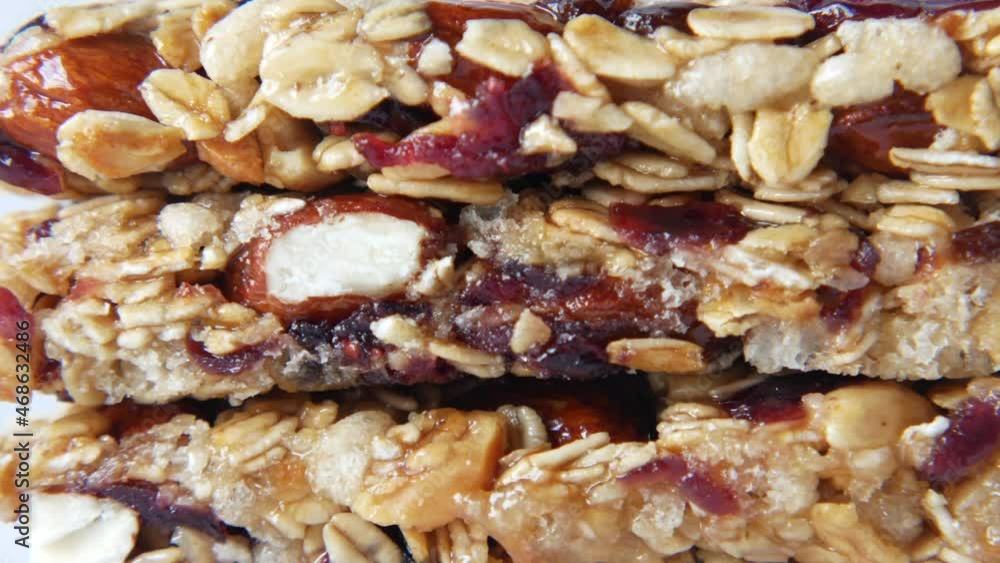 detail shot of Almond , Raisin and oat protein bars on table detail shot of Almond , Raisin and oat protein bars on table