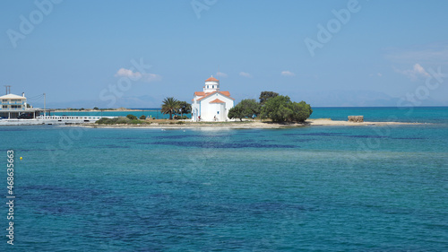 Beautiful small landmark church Of Agios Spyridon in port and main seaside town of Elafonisos island, Lakonia, Peloponnese, Greece