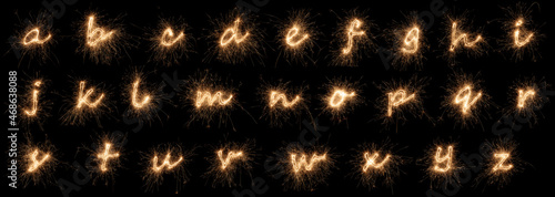 Tableau sur toile complete full golden bright sparkler alphabet font letter set collection A to Z isolated dark black background