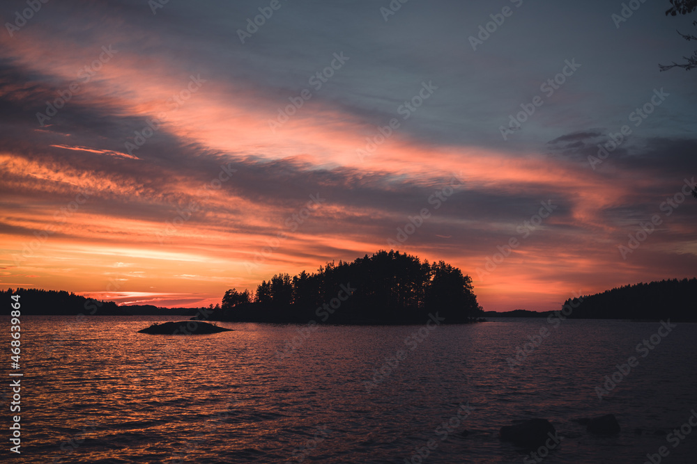vibrant sunset with an island
