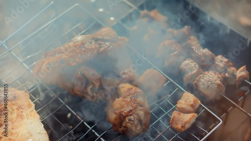 Wallpaper Mural Roasting Tasty Pork Knuckle With Spices , Herbs In Burning Charcoals Fire On BBQ Grid. Meat Smoked On Fire On Picnic. Pork Knuckle Roasting Barbecue Grill Grid. Grilled Food In Camping. Hot Grill Grid Torontodigital.ca