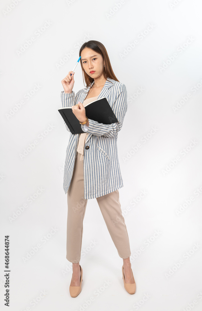 Photograph of a collective series of young asian secretary lady with book in hand with different expression, moods and gesture. Very suitable for all kind of office media application and usage. Photograph of a collective series of young asian secretary lady with book in hand with different expression, moods and gesture. Very suitable for all kind of office media application and usage.