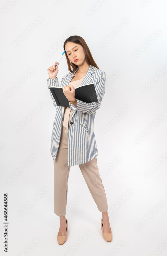 Photograph of a collective series of young asian secretary lady with book in hand with different expression, moods and gesture. Very suitable for all kind of office media application and usage. Photograph of a collective series of young asian secretary lady with book in hand with different expression, moods and gesture. Very suitable for all kind of office media application and usage.