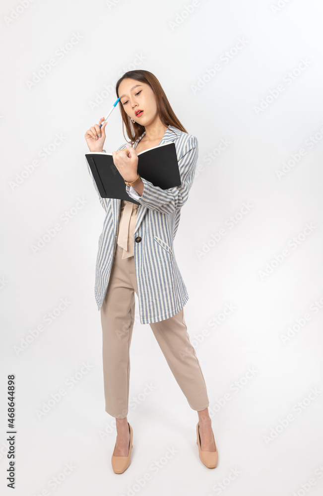 Photograph of a collective series of young asian secretary lady with book in hand with different expression, moods and gesture. Very suitable for all kind of office media application and usage. Photograph of a collective series of young asian secretary lady with book in hand with different expression, moods and gesture. Very suitable for all kind of office media application and usage.