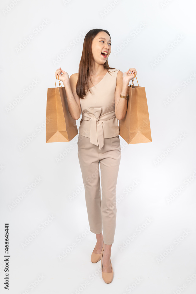 A series of photo collection focusing on the moments, expression and gestures of an asian office lady with brown shopping bag that also look like delivery bag. All are full body, high resolution shots A series of photo collection focusing on the moments, expression and gestures of an asian office lady with brown shopping bag that also look like delivery bag. All are full body, high resolution shots