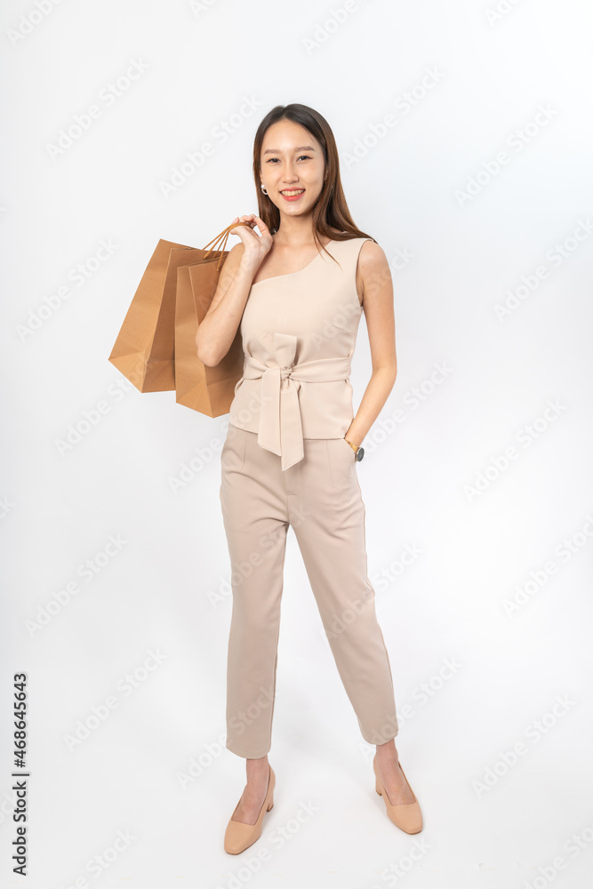 A series of photo collection focusing on the moments, expression and gestures of an asian office lady with brown shopping bag that also look like delivery bag. All are full body, high resolution shots A series of photo collection focusing on the moments, expression and gestures of an asian office lady with brown shopping bag that also look like delivery bag. All are full body, high resolution shots