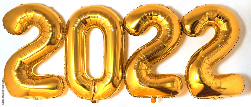 Figures 2022 made of gold foil balloons. White minimalistic background. Signs and symbols of the new year. Figures 2022 made of gold foil balloons. White minimalistic background. Signs and symbols of the new year.