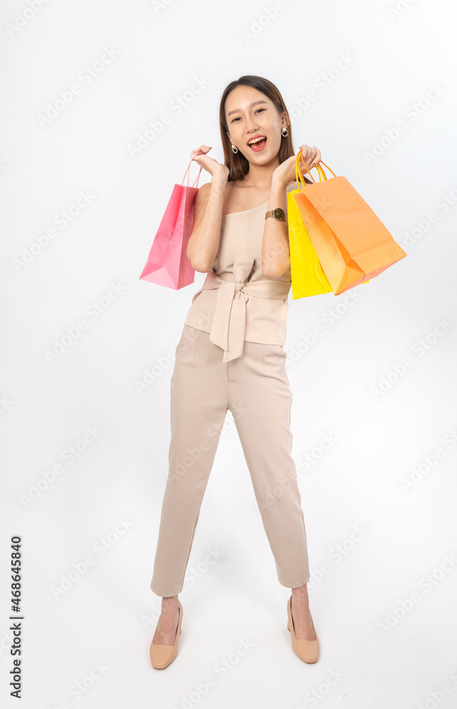 Photograph of a collective series of young asian lady with colorful shopping bags with different expression, moods and gesture. Very suitable for all kind of media application and usage. Photograph of a collective series of young asian lady with colorful shopping bags with different expression, moods and gesture. Very suitable for all kind of media application and usage.