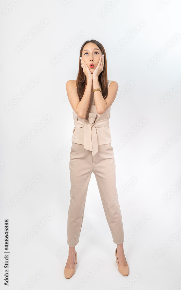 Photograph of a young asian office lady in her office suit. This is part of a series photo collection focusing on the moments, expression and gestures of an asian office lady.