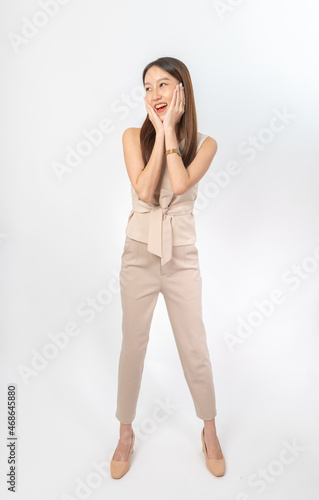 Photograph of a young asian office lady in her office suit. This is part of a series photo collection focusing on the moments, expression and gestures of an asian office lady.