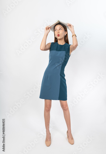 Photograph of a collective series of young asian secretary lady with book in hand with different expression, moods and gesture. Very suitable for all kind of office media application and usage. © asean studio