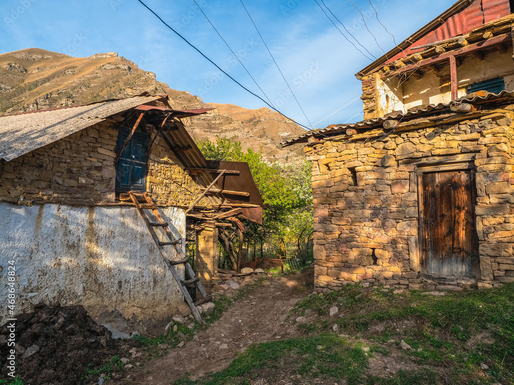 Rural clay and stone houses in a village in Kakhib. Narrow alleys of a mountain village. Old mountain village in Dagestan. Rural clay and stone houses in a village in Kakhib. Narrow alleys of a mountain village. Old mountain village in Dagestan.