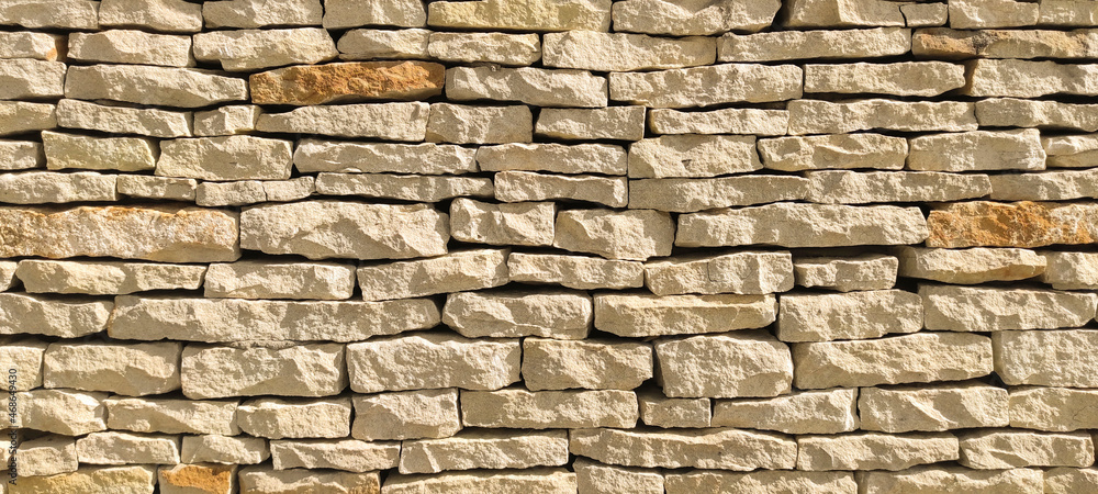 Old sandstone wall. As background