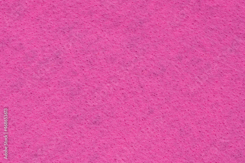 Light pink-coloured felt. Non-woven fabric texture