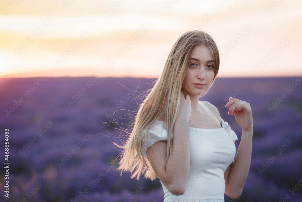 Beautiful girl on the lavender field.