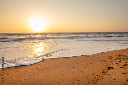 Fototapeta Naklejka Na Ścianę i Meble -  Sunrise- paradise picture  in yellow colors in indian Goa!