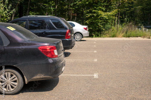 Car parking on the side of the road close-up.