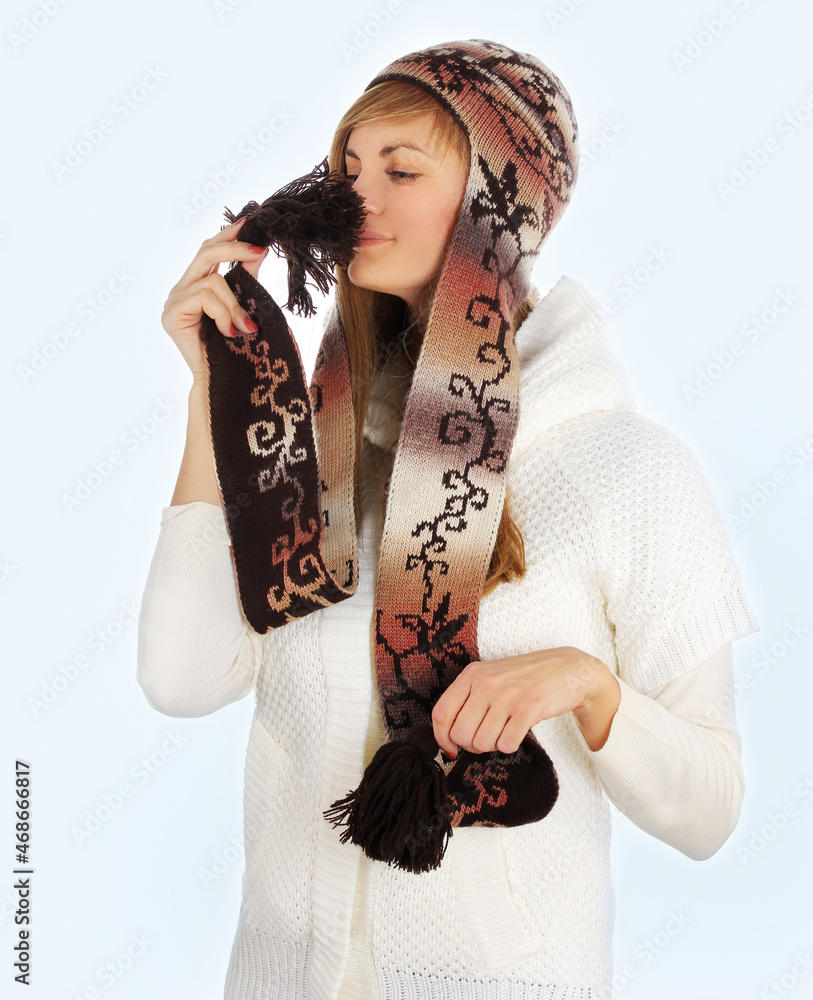 Beautiful girl wearing knit  scarf and  sweater