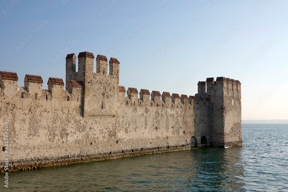 Scaliger Castle in Sirmione, ancient Castle in the Historical town Sirmione on peninsula in Garda lake, Lombardy, Italy 