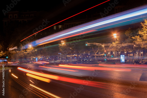 Night photography of lines of light drawn by vehicle traffic when the traffic light is green going down Calle de Alcalá in Madrid © Fernando