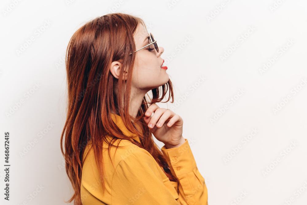 fashionable woman in yellow shirt sunglasses posing fashionable woman in yellow shirt sunglasses posing