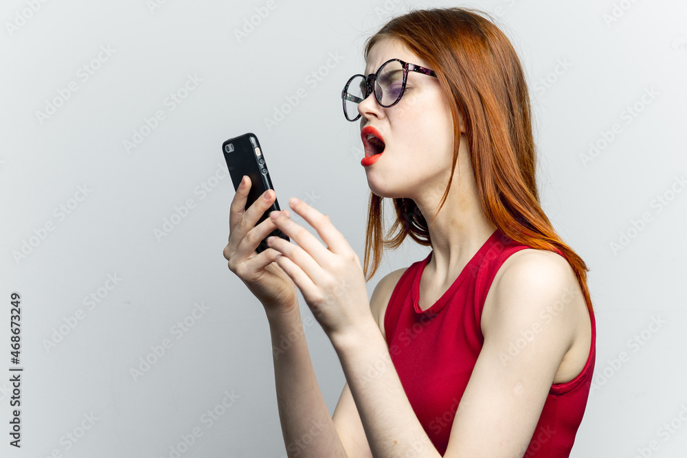 pretty woman with glasses talking on the phone technology lifestyle