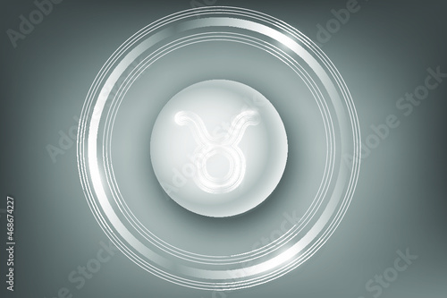 Glowing Zodiac Sign on a white button. Astrological symbolism.