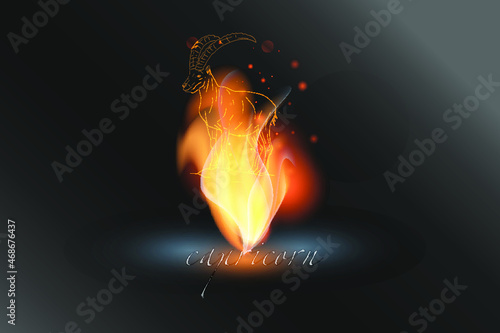 Zodiac sign in a glowing flame on a gray background. Astrological symbolism.