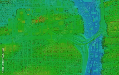 Digital elevation model. GIS 3D illustration made after proccesing aerial pictures taken from a drone. It shows the area of the city with tight buildings with a road viaduct passing over the valley photo