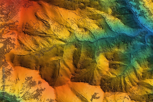 Digital elevation model. GIS product made after proccesing aerial pictures taken from a drone. It shows high rocky and steep mountain peaks. At their feet are visible valleys and mountain lakes