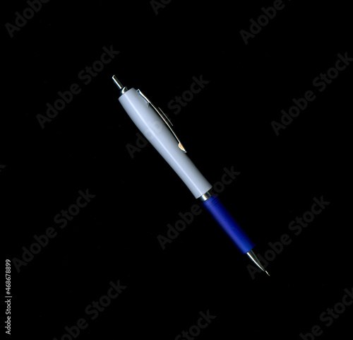 A pen with a scan effect on a black background