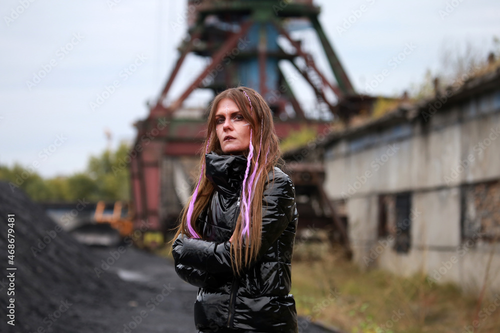 Young woman in industrial place Young woman in industrial place