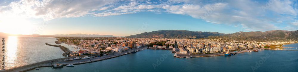 Aerial seaside view over seaside city of Kalamata, Greece at sunset