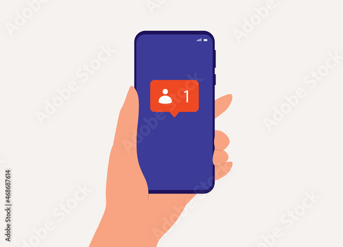 Close-Up View Of User's Hand With Mobile Phone Receiving Notification On Social Media Followers.