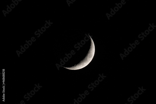 Crescent moon over clear night sky