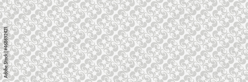 Light background images with abstract ornament on a gray background for your design. Seamless background for wallpaper, textures.