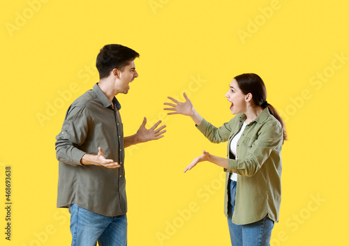Young couple quarreling on ...