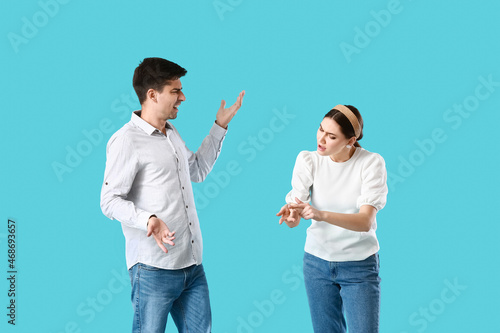 Young couple quarreling on ...