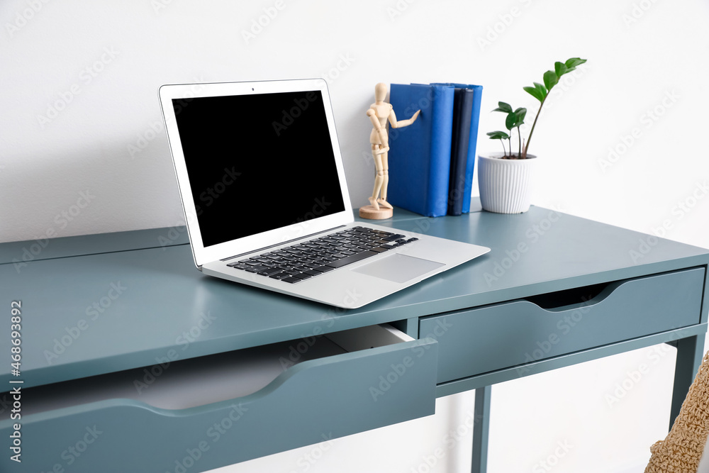 Fototapeta premium Stylish workplace near wall in room