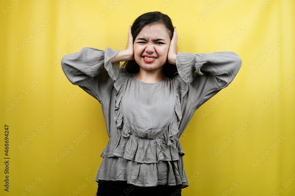 Beautiful young woman with hands covering ears, noise, isolated Beautiful young woman with hands covering ears, noise, isolated