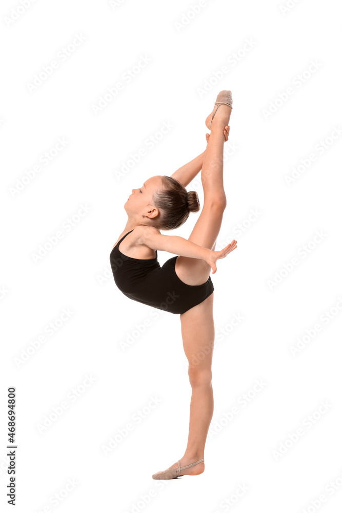 Little girl doing gymnastics on white background