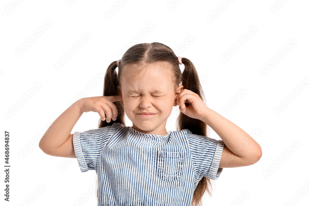 Portrait of pretty little girl plugging ears on white background Portrait of pretty little girl plugging ears on white background