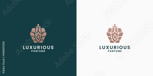 luxury perfume logo design. bottle perfume symbol with golden color